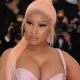 Nicki Minaj is facing a lawsuit filed by her former tour manager, Brandon Garrett, who alleges assault and battery during her Pink Friday 2 tour